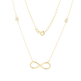 14k solid yellow gold infinity necklace with bezel set zircon on a white background by Qutahia Jewelry
