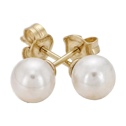 14k solid gold natural pearl stud earrings on a white background by Qutahia Jewelry
