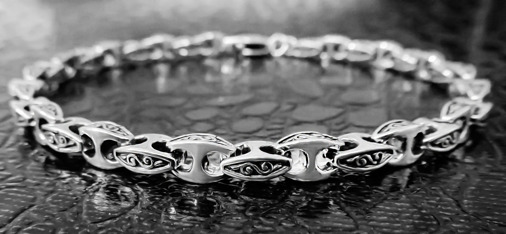 Detailed close-up of an oxidized gents silver bracelet by Qutahia Jewellery.