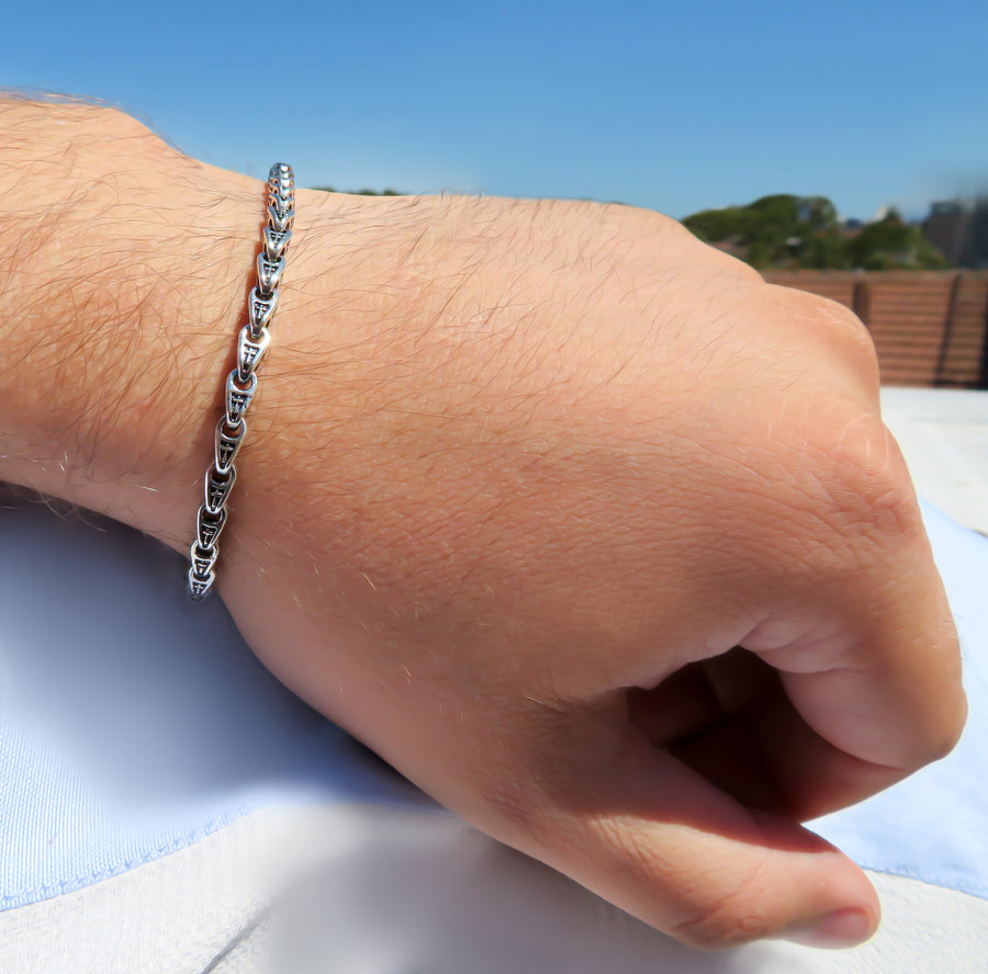 Mens silver bracelet sterling silver with cross motif by Qutahia Jewellery