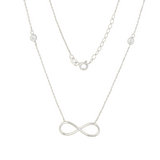 Qutahia Jewelry 14k yellow gold infinity necklace with bezel-set clear zircon and delicate chain.
